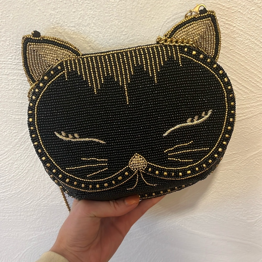 Mary frances cat handbag. Small/ black and says meow in the flap